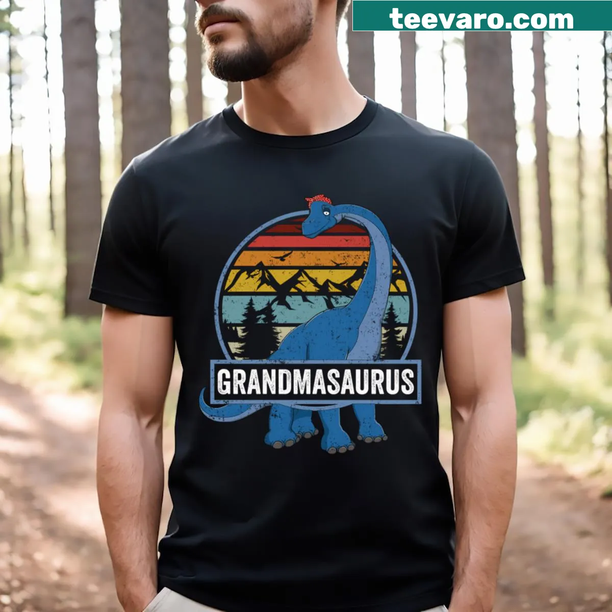Illustration of a dinosaur with the text 'Grandmasaurus' — on a men's t-shirt