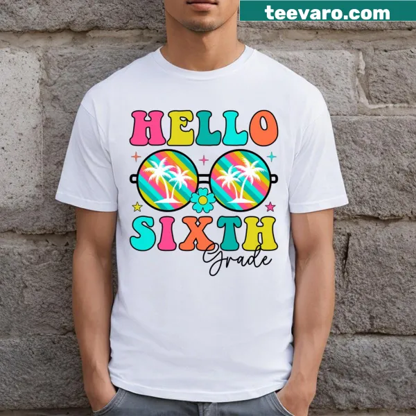 Cheerful text 'Hello Sixth Grade Team' on a back-to-school T-shirt.