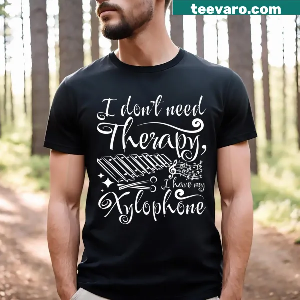 Playful t-shirt stating 'I Dont Need Therapy Xylophone Essential'.