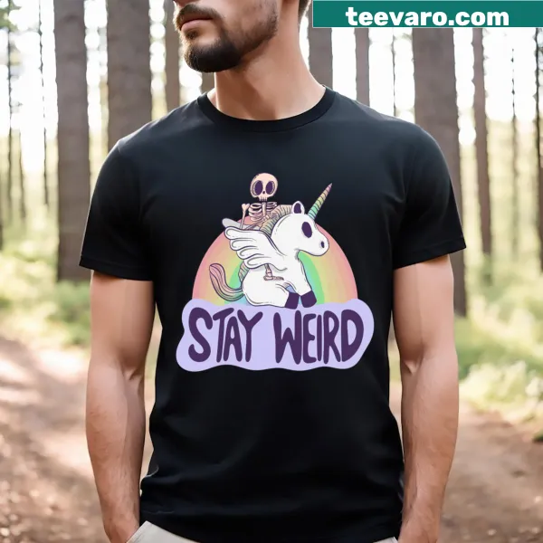 Cartoon skeleton riding a unicorn in a surreal setting on a T-shirt.