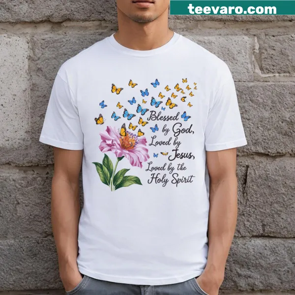 T-shirt featuring a butterfly and cross design with the phrase 'Blessed By God'