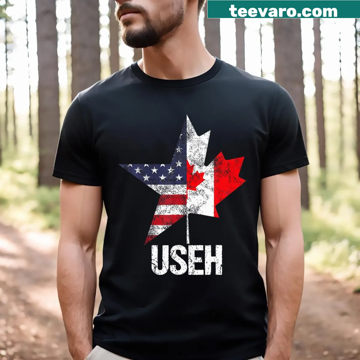 T-shirt featuring badge-emblem design of Canada and USA flags — on a men's t-shirt