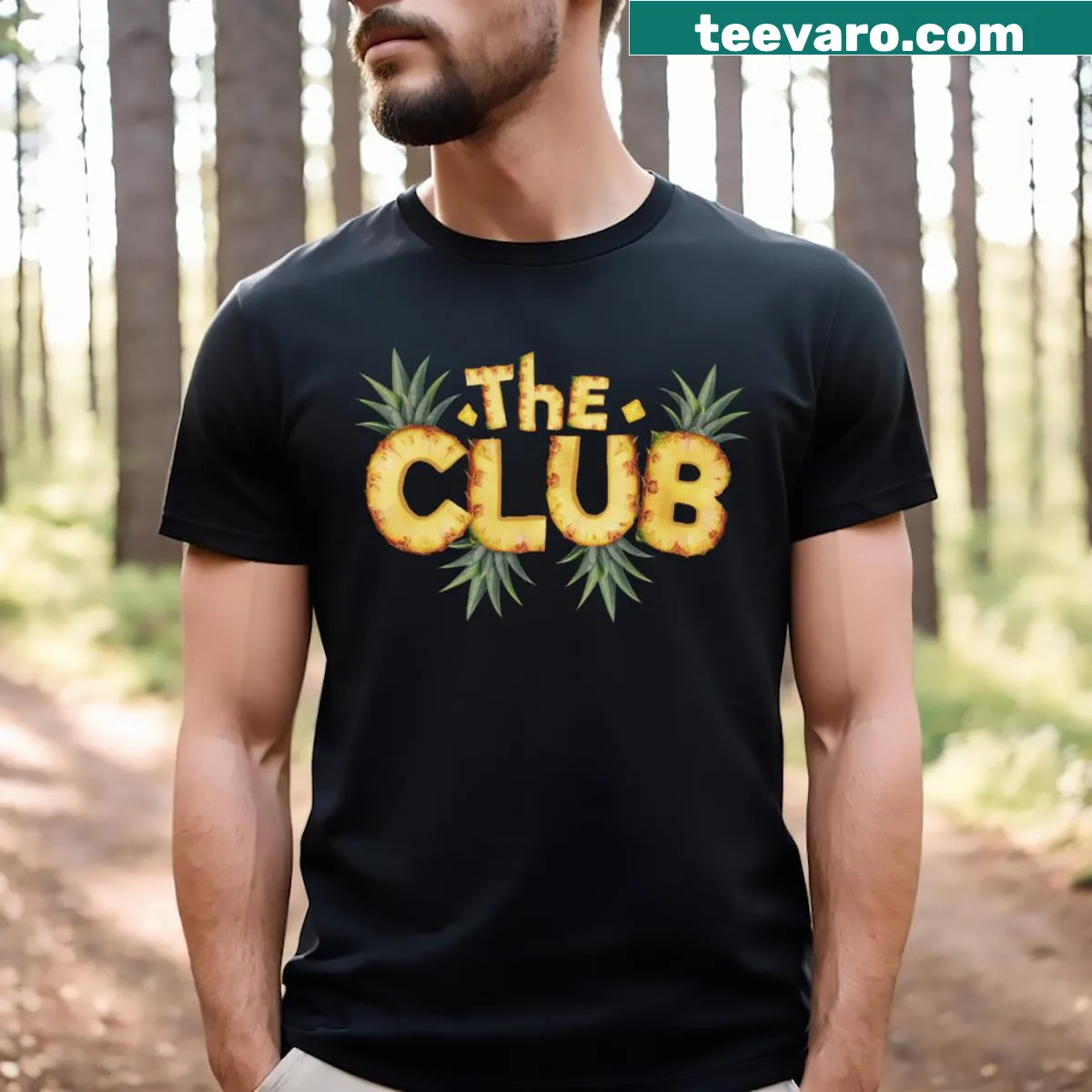 Playful writing club graphic on T-shirt with pineapples — on a men's t-shirt