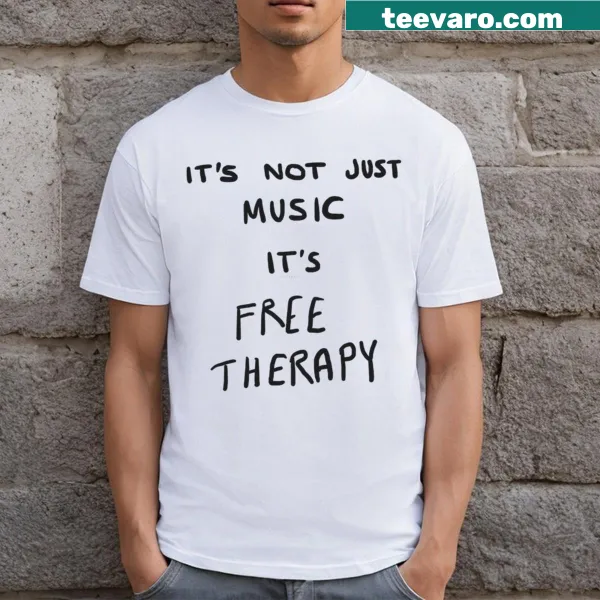 Inspirational T-shirt stating 'Music Is Therapy' with a heartfelt graphic