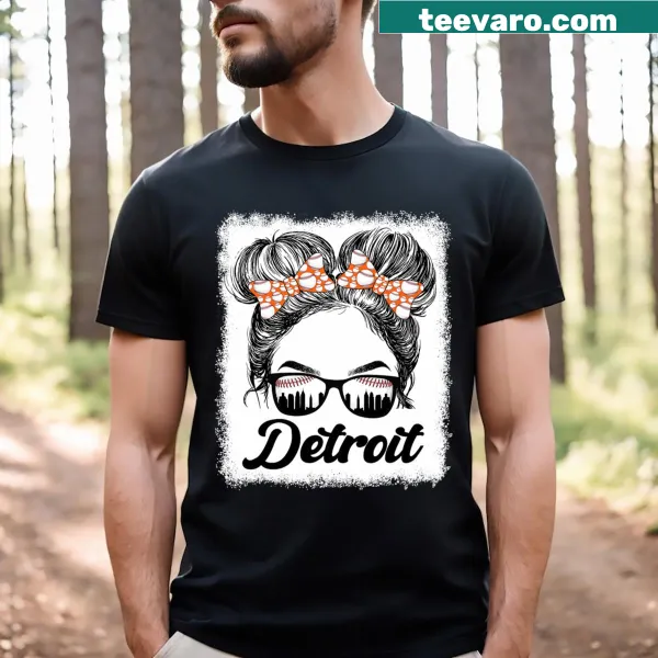 Retro graphic tee of a girl with messy bun, celebrating baseball