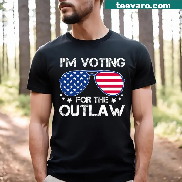 T-shirt featuring 'I'm Voting For The Outlaw' in front of stylized sunglasses