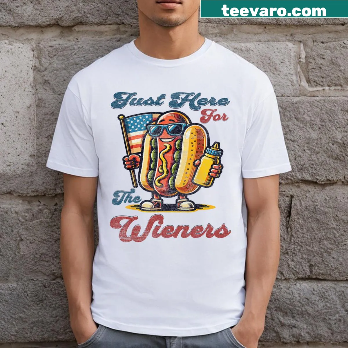 Humorous T-shirt with 'Hot Dog I'm Just Here For The Wieners' text — on a men's t-shirt