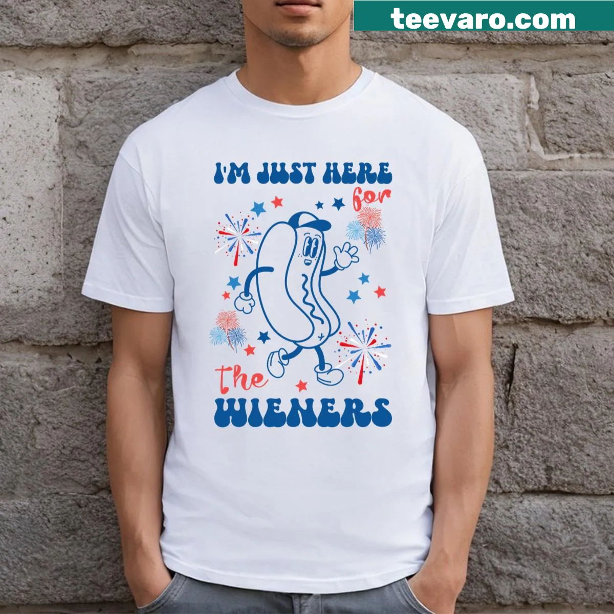Funny Fourth of July t-shirt with the slogan: I’m Just Here for the Wieners — on a men's t-shirt