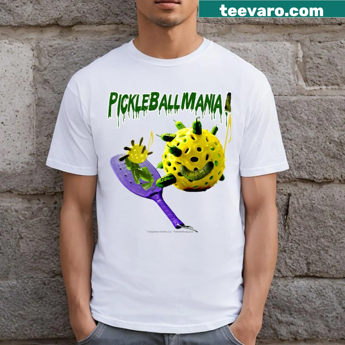 Playful t-shirt featuring a purple pickleball paddle and Polish dillpickles — on a men's t-shirt