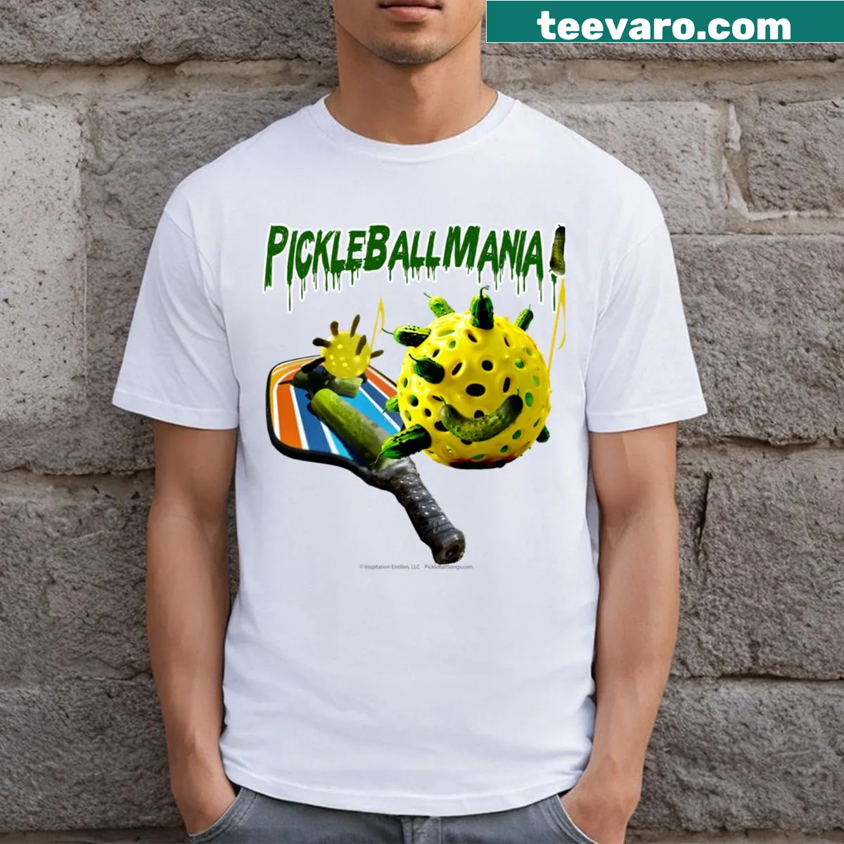 Illustrative T-shirt featuring a pickleball paddle and dillpickles — on a men's t-shirt
