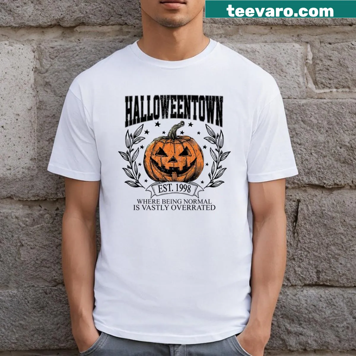 Nostalgic T-shirt inspired by Halloweentown with pumpkins and autumn theme — on a men's t-shirt