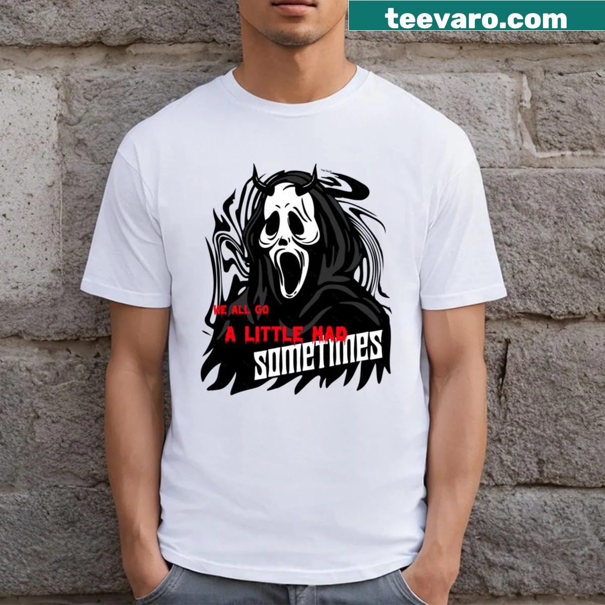 Horror movie inspired t-shirt with the phrase 'We All Go A Little Mad Sometimes' in bold lettering — on a men's t-shirt