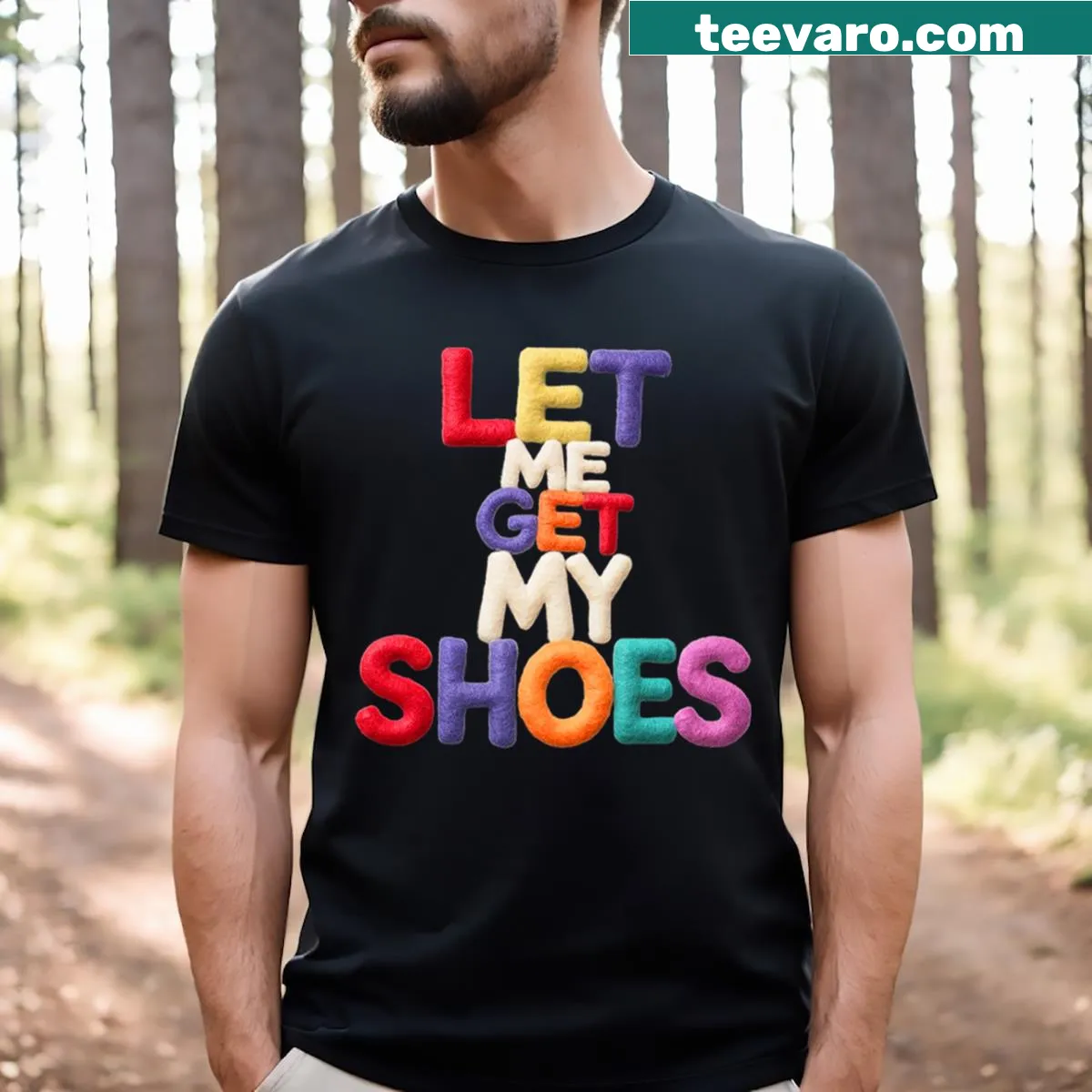 Playful T-shirt featuring the phrase 'Let Me Get My Shoes' prominently — on a men's t-shirt