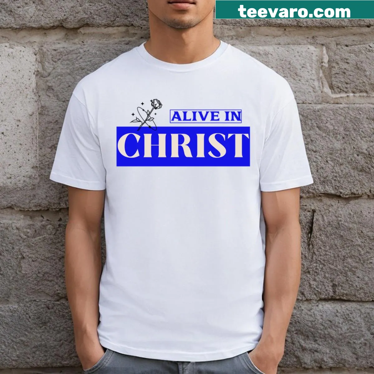 Typography 'Alive In Christ' graphic on a t-shirt — on a men's t-shirt