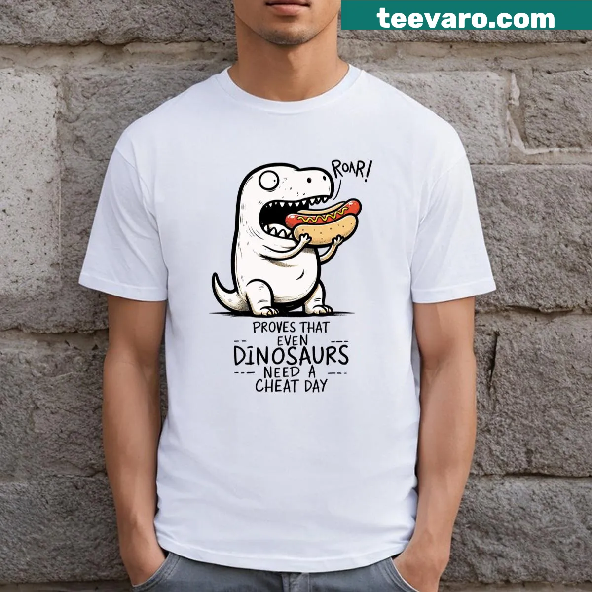 Humorous T-shirt featuring dinosaurs celebrating a cheat day with playful text. — on a men's t-shirt
