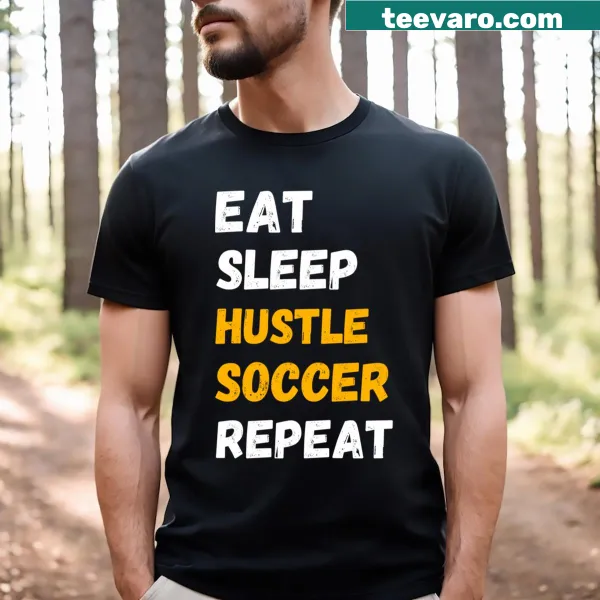 Funny soccer T-shirt with the phrase 'Eat Sleep Hustle Soccer Repeat'