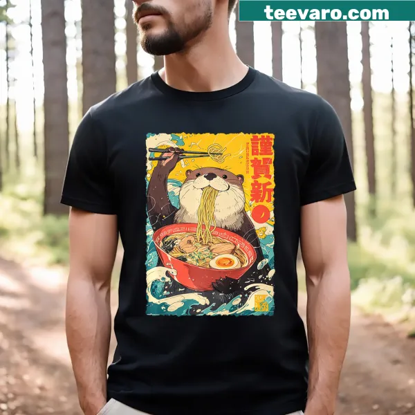 Illustrated otter eating ramen noodles in a manga style on a t-shirt.