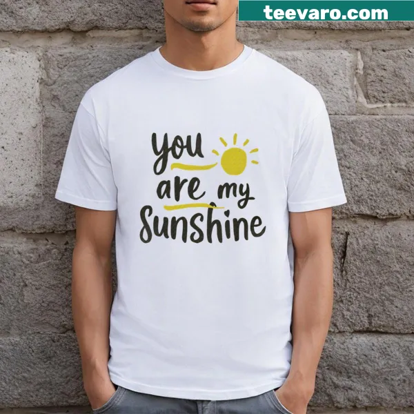 Whimsical sunshine graphic t-shirt for positivity lovers.
