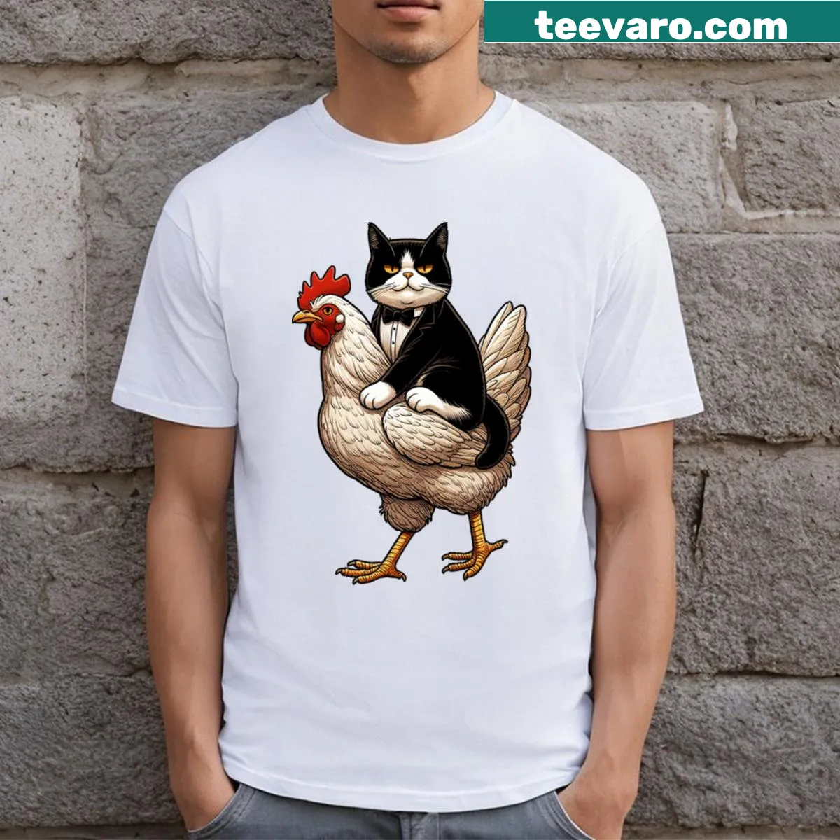 Tuxedo cat riding on a chicken graphic T-shirt — on a men's t-shirt