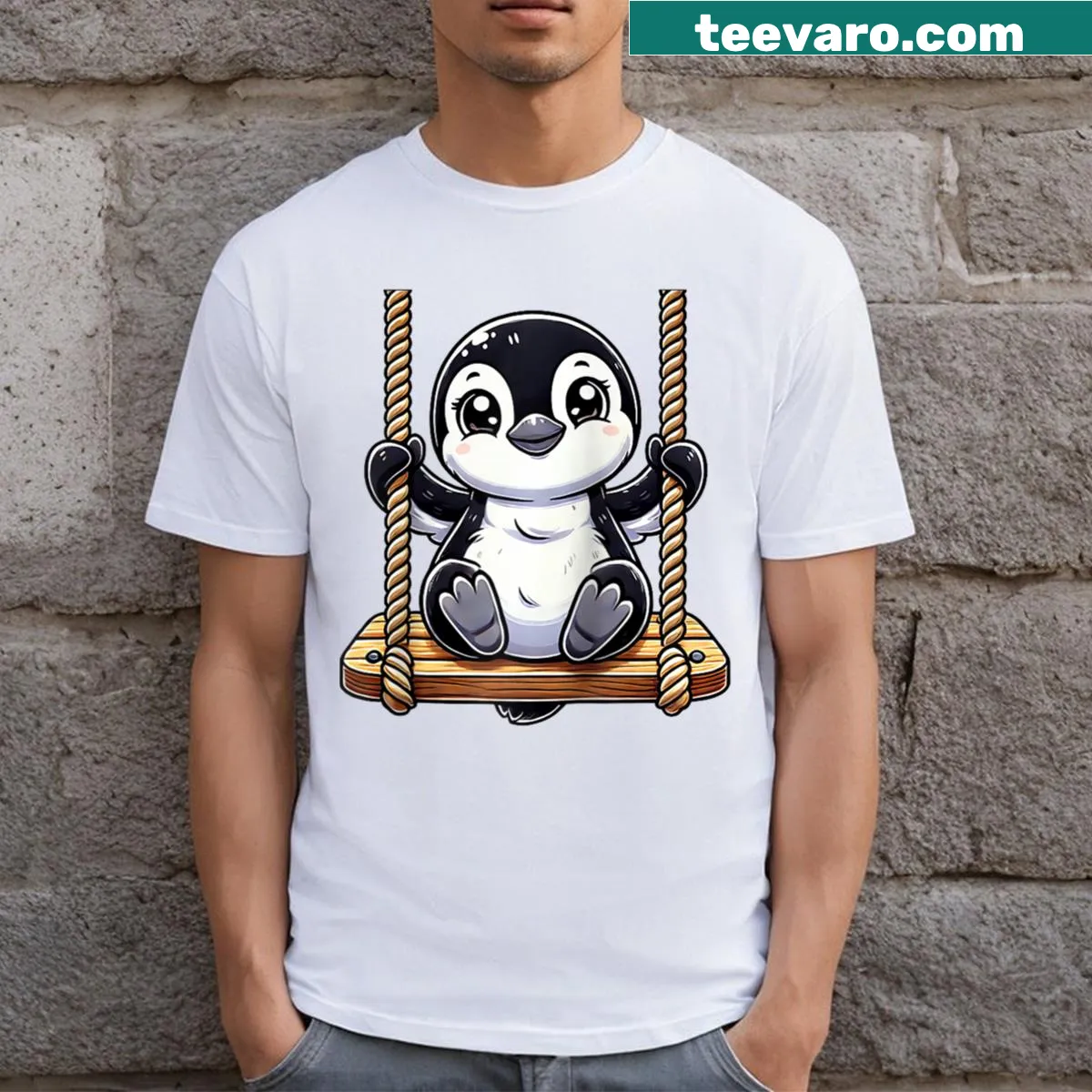 Cartoon penguin swinging on a playground on a raglan baseball tee — on a men's t-shirt