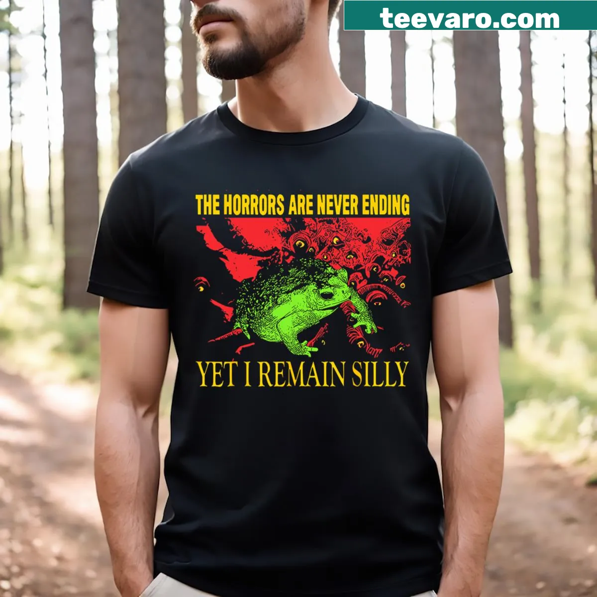 Funny cartoon frog t-shirt about enduring horrors with humor — on a men's t-shirt