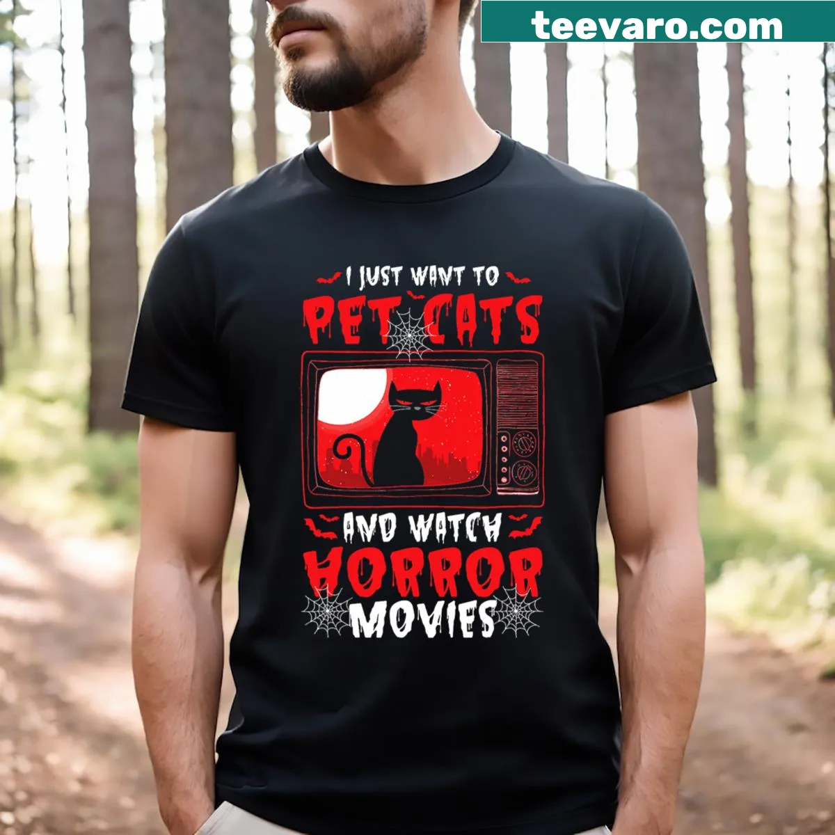 Humorous Halloween t-shirt featuring cats and horror movies theme. — on a men's t-shirt