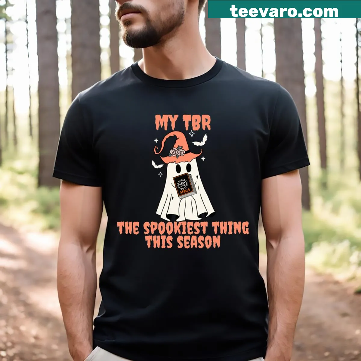 T-shirt featuring playful Halloween-themed book graphic — on a men's t-shirt