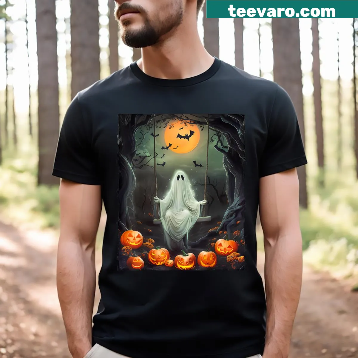 Vintage Halloween t-shirt with ghost on swing and pumpkins — on a men's t-shirt