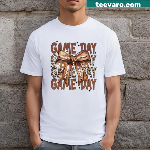 Vintage football-themed T-shirt with bow and flower graphic