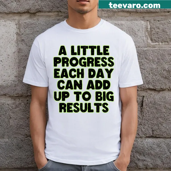 Motivational shirt with text about progress and results.