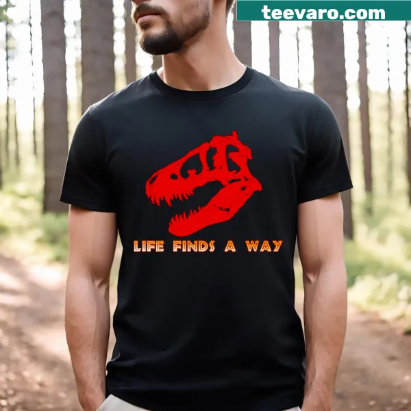 Illustration T-shirt featuring a T-Rex with the phrase 'Life Finds A Way'