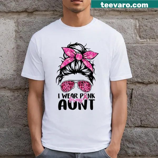 Breast cancer awareness shirt with messy bun and pink text.