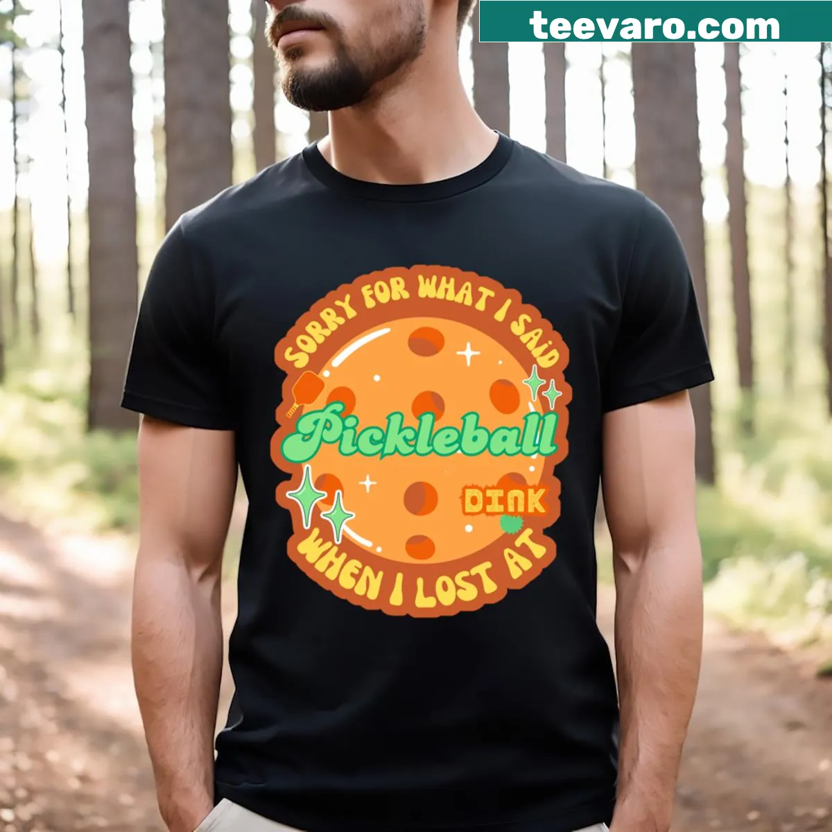 Retro T-shirt with playful pickleball graphics emphasizing sportsmanship. — on a men's t-shirt