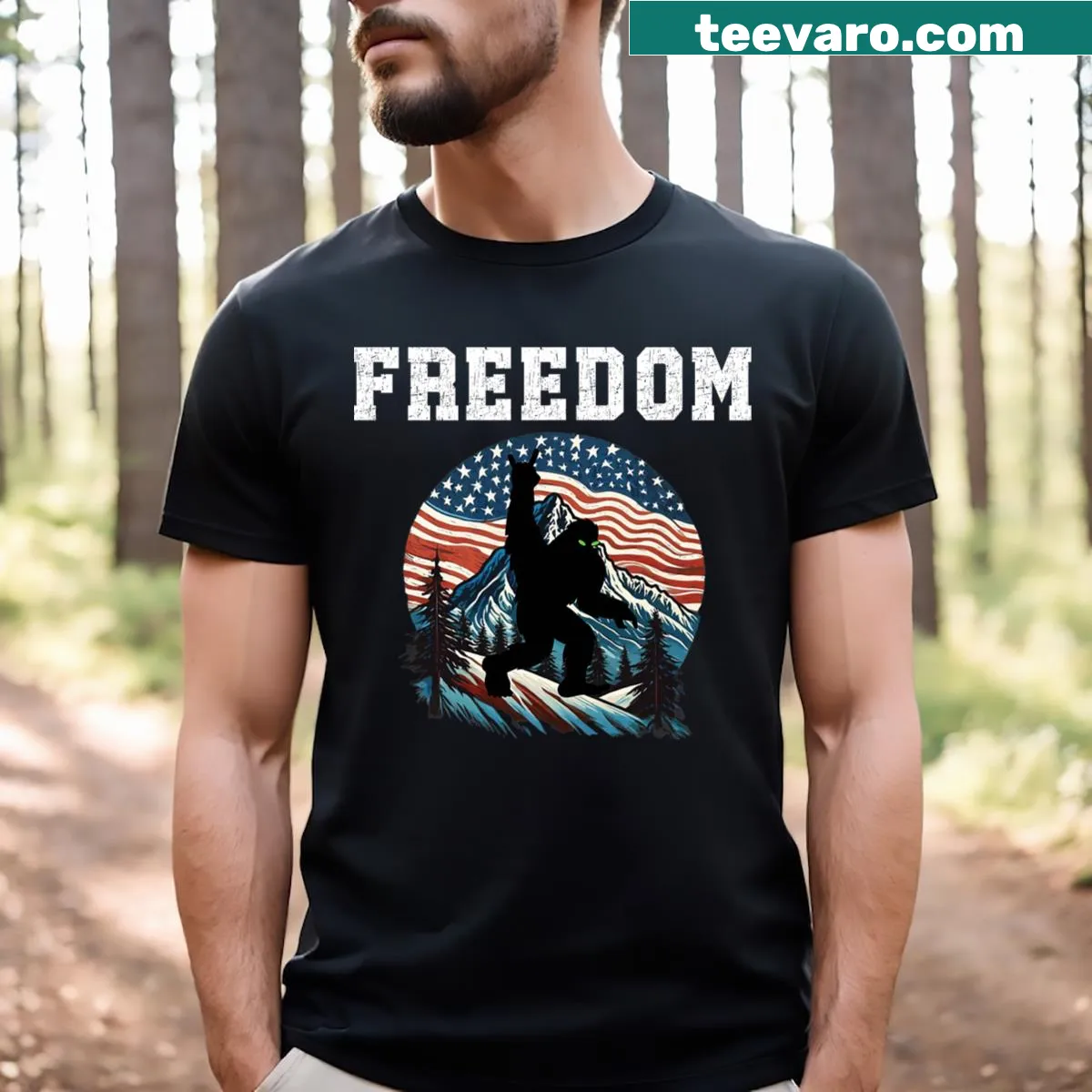 T-shirt featuring Bigfoot and American flag illustration — on a men's t-shirt