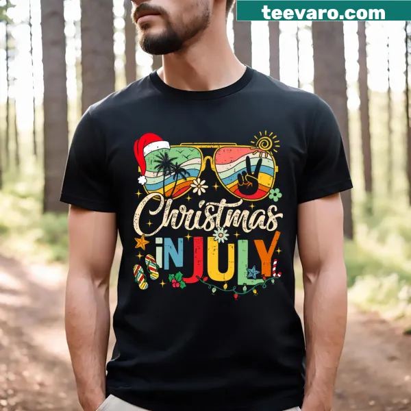 Cartoon Santa in sunglasses on beach graphic t-shirt