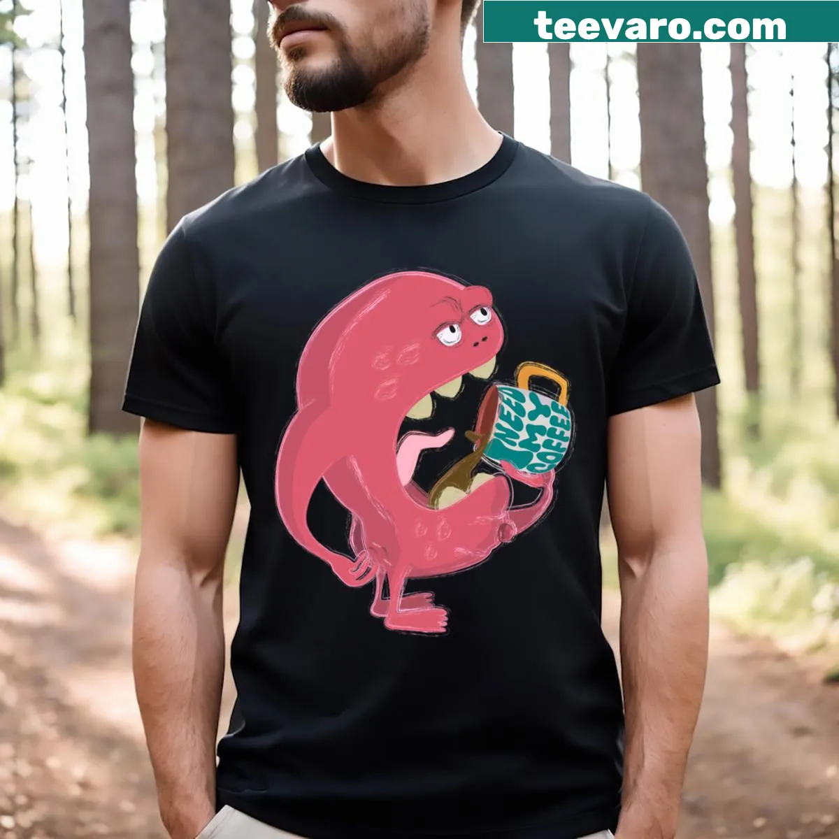Funny t-shirt featuring a monster obsessively holding a cup of coffee — on a men's t-shirt