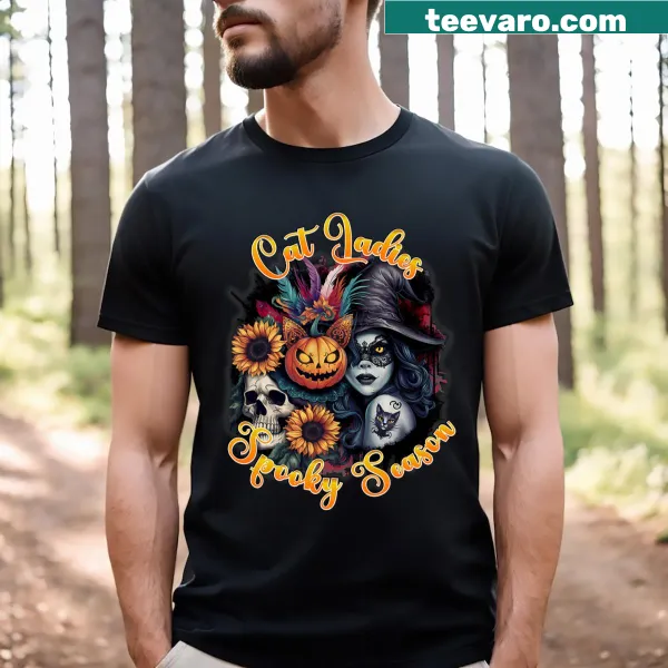 Halloween-themed Cat Ladies t-shirt with skulls and pumpkins