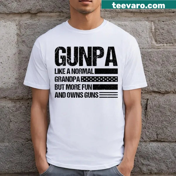 Humorous grandpa shirt featuring USA-themed text about owning guns