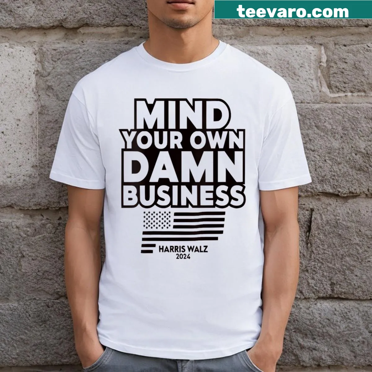 Bold text 'Mind Your Own Damn Business' shirt featuring Kamala Harris. — on a men's t-shirt
