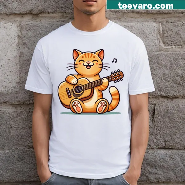 Illustration of an orange tabby cat playing a guitar on a T-shirt.