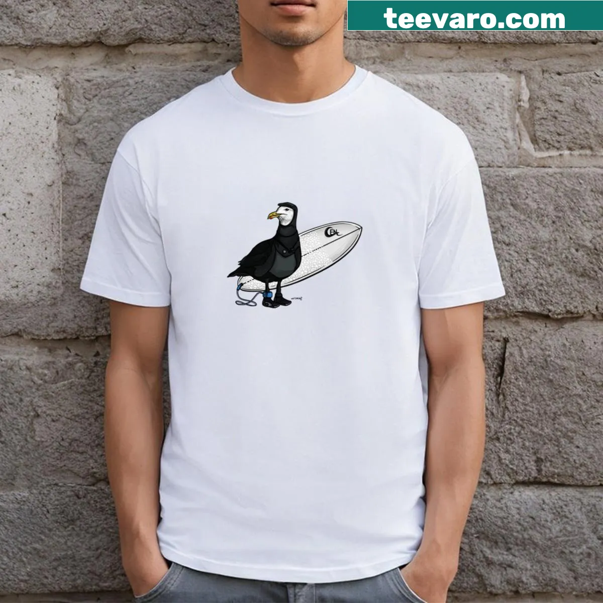 Whimsical t-shirt featuring a surfing seagull — on a men's t-shirt