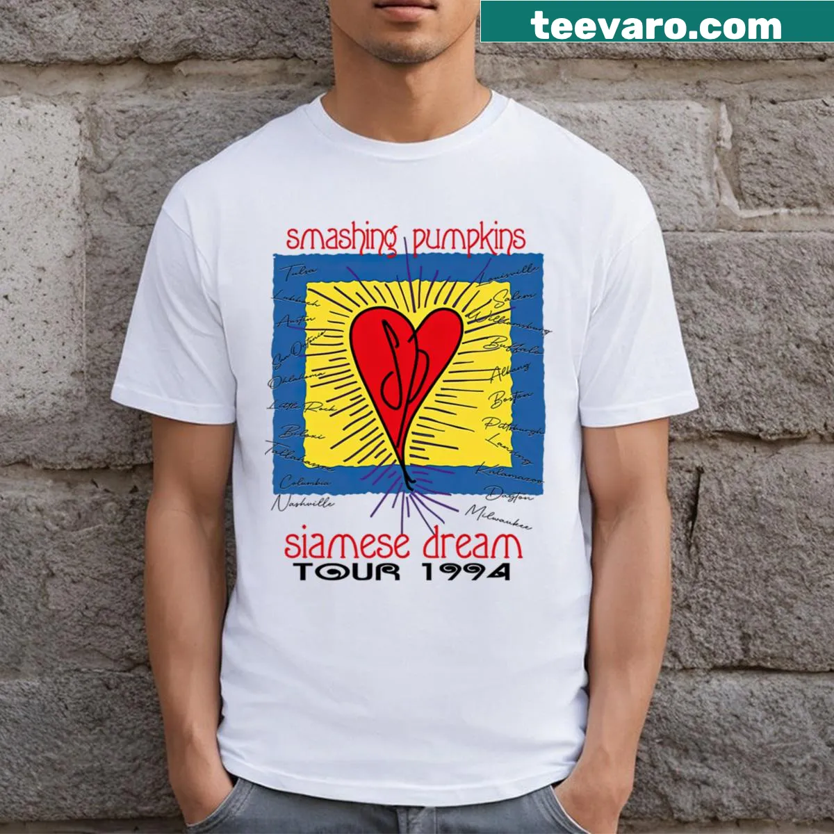 Vintage-style band logo t-shirt featuring various album designs — on a men's t-shirt
