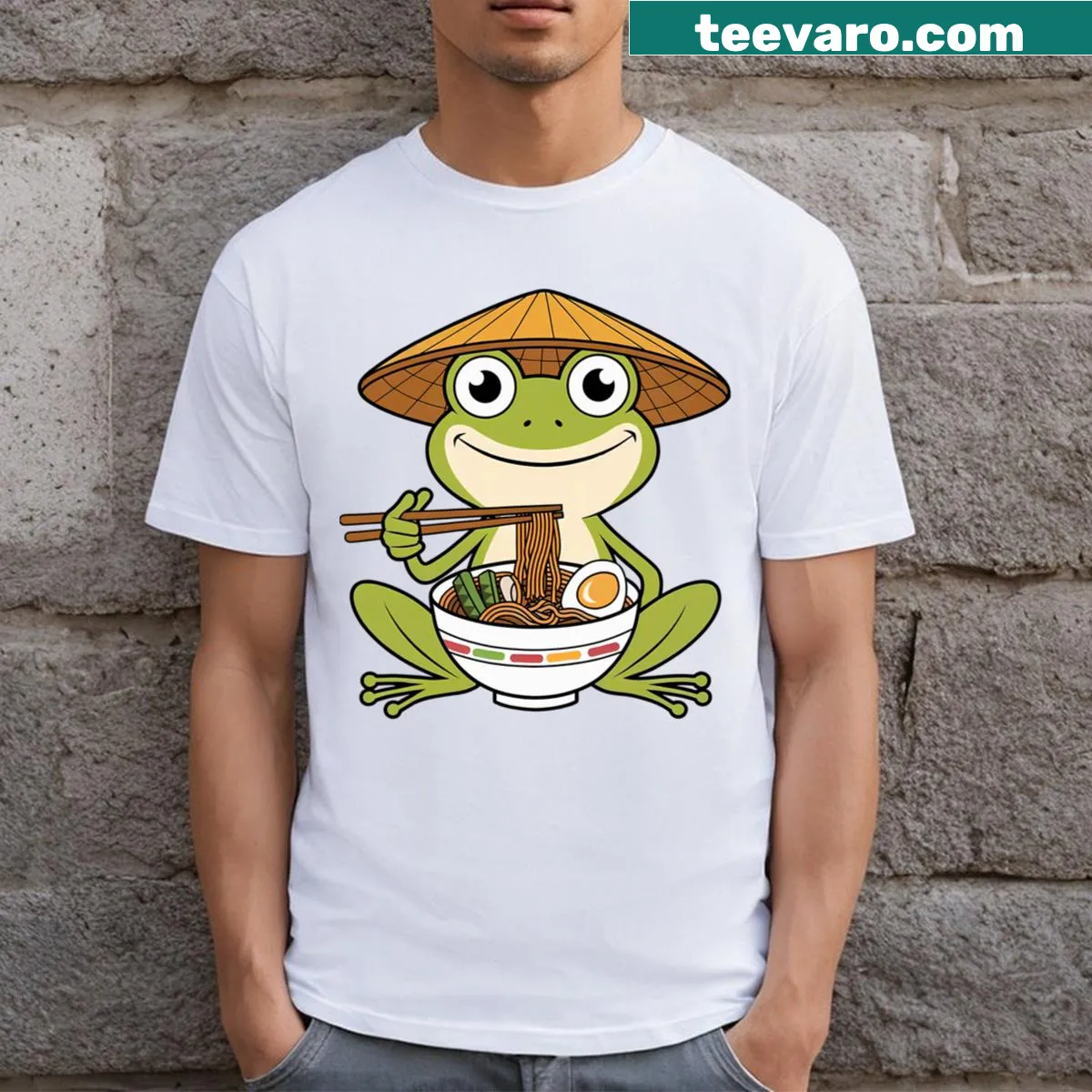 Kawaii frog enjoying noodles in a ramen bowl on a T-shirt — on a men's t-shirt