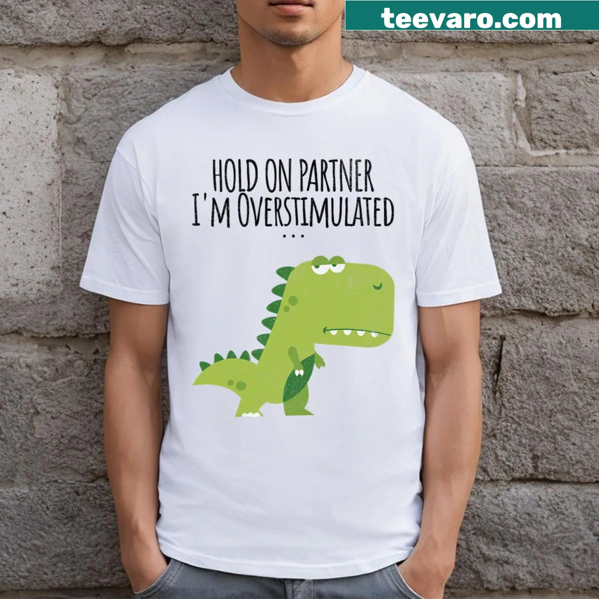 Dinosaur graphic tee with humorous overstimulation slogan — on a men's t-shirt