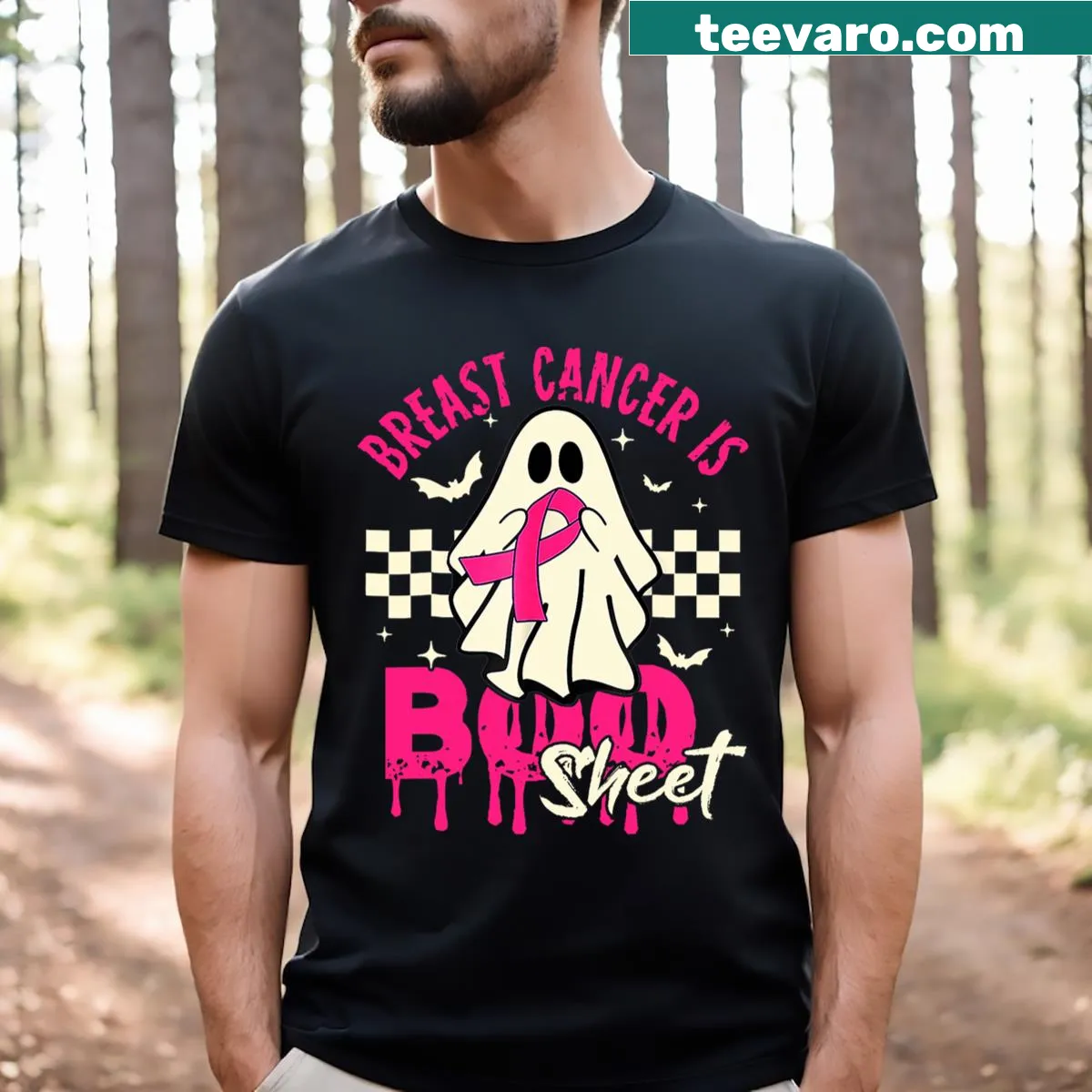 Halloween t-shirt featuring a ghost with breast cancer awareness ribbons — on a men's t-shirt
