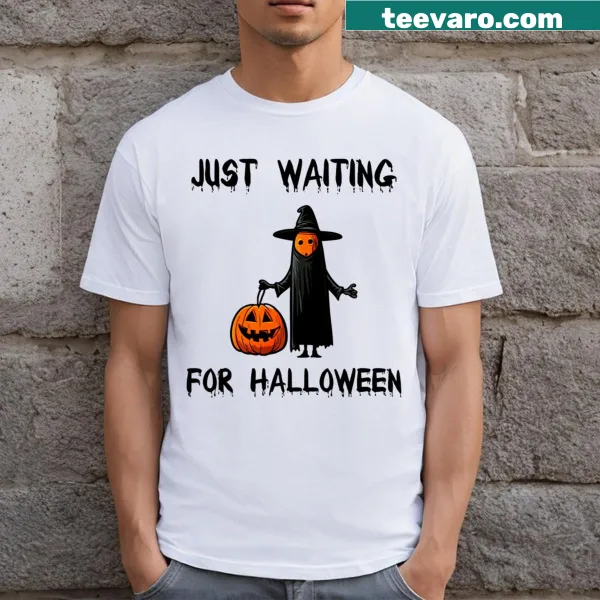 Whimsical Halloween T-shirt featuring a playful pumpkin and witch design.