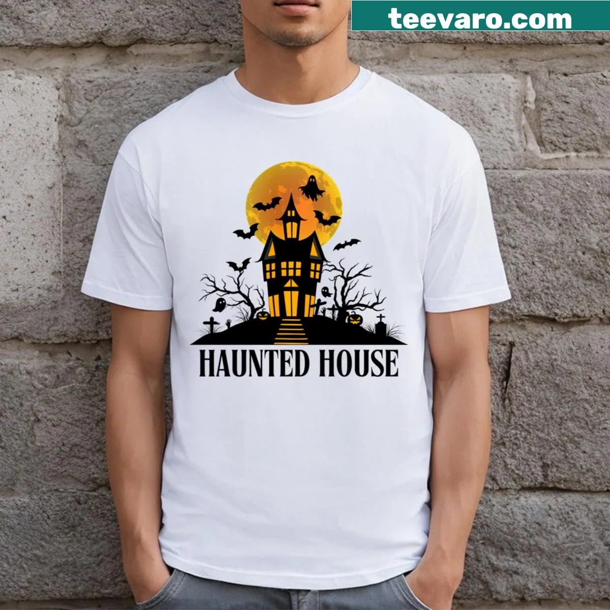 Haunted House Halloween t-shirt with spooky silhouette graphic — on a men's t-shirt