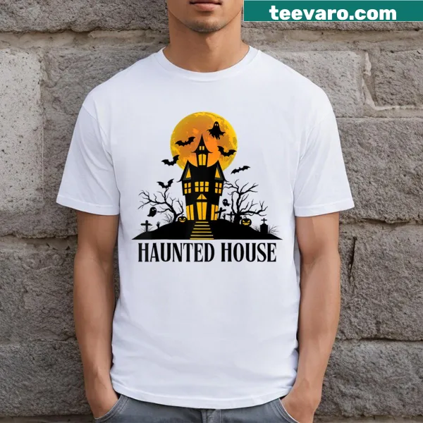 Haunted house illustration on a Halloween raglan baseball tee.