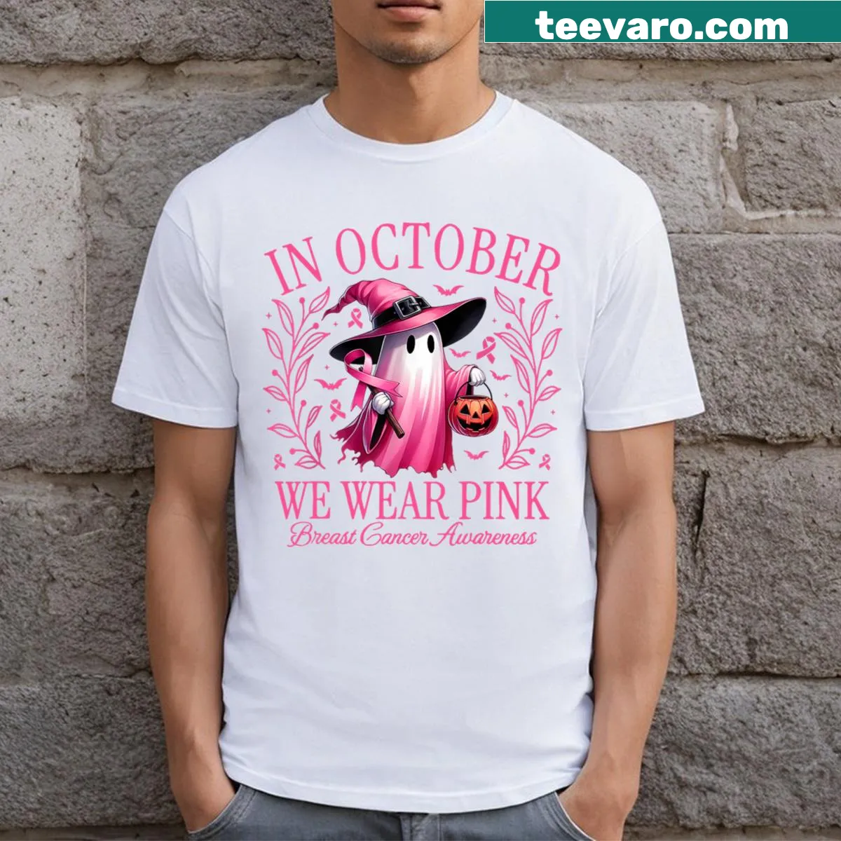 Breast Cancer Awareness Halloween T-shirt with 'In October We Wear Pink' — on a men's t-shirt