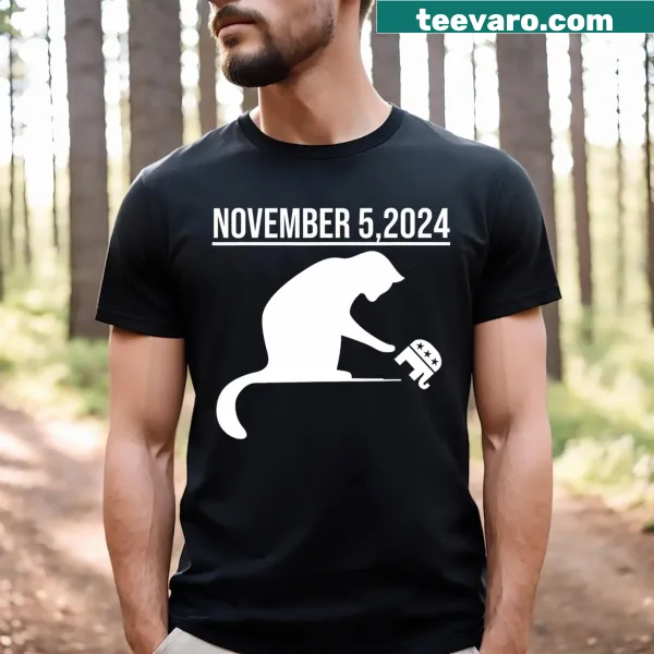 Whimsical cat-themed T-shirt with a humorous empowerment graphic